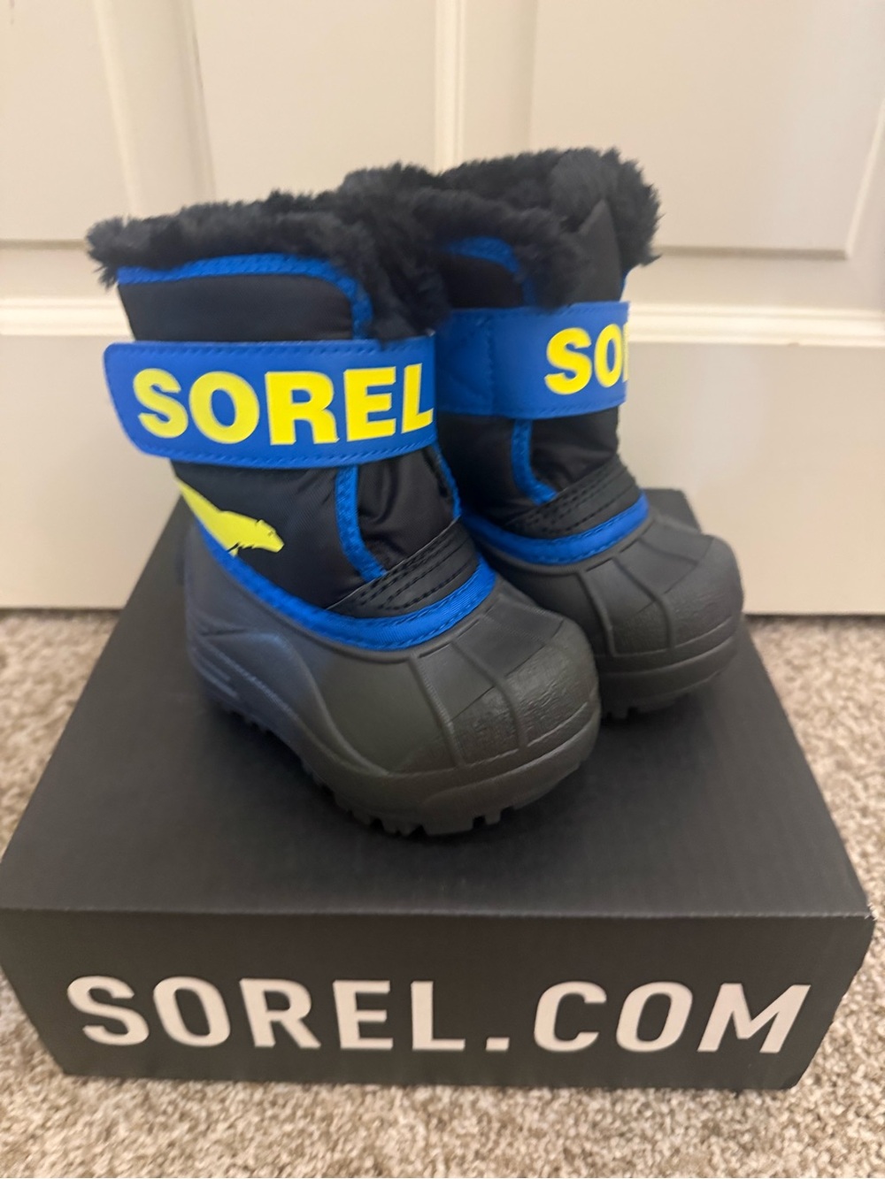 Sorel Toddlers Black and Blue Snow Boots with Yellow Logo